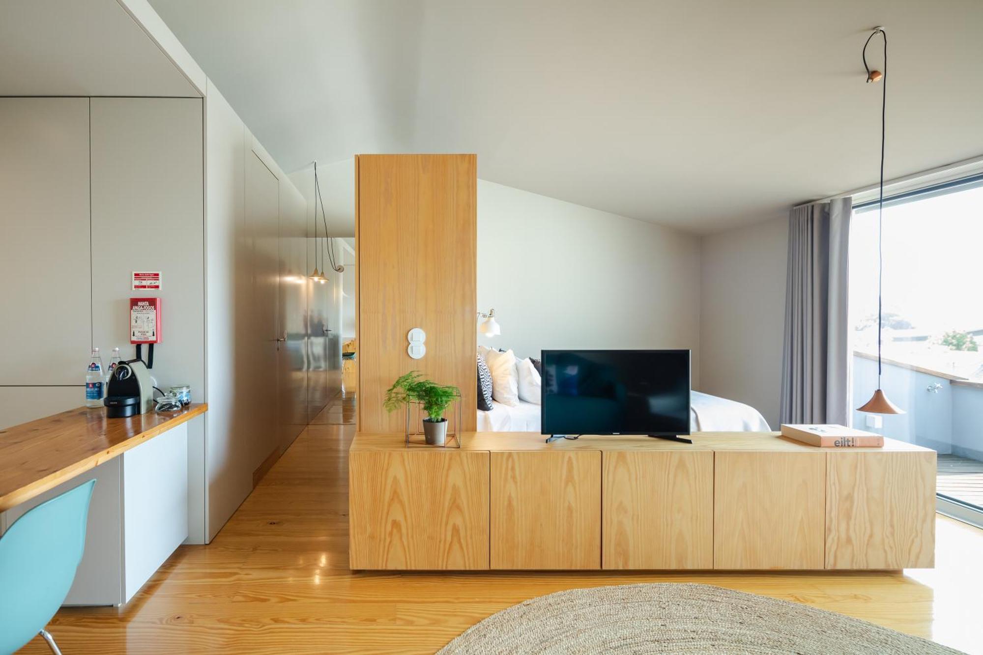 Baumhaus Serviced Living - Art & Design Apartments Porto Rom bilde